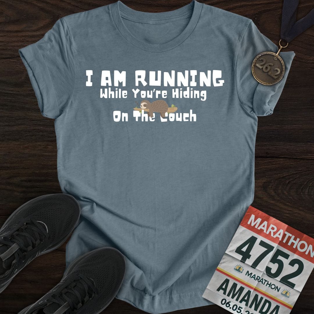 Printify T-Shirt Heather Indigo / S I’m Running While You’re Hiding on the Couch T-shirt