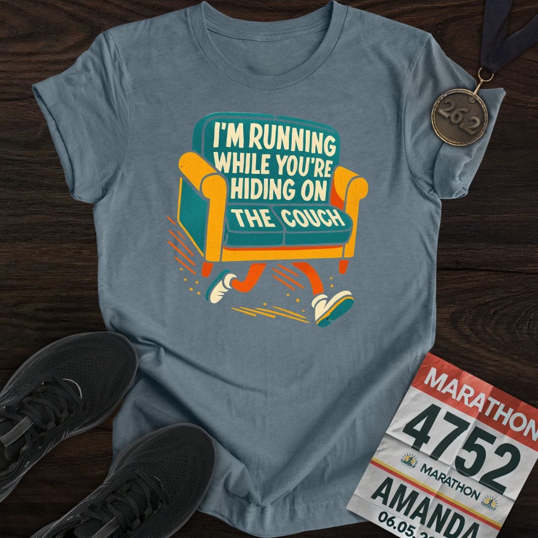Printify T-Shirt Heather Indigo / S I’m Running While You’re Hiding on the Couch T-shirt