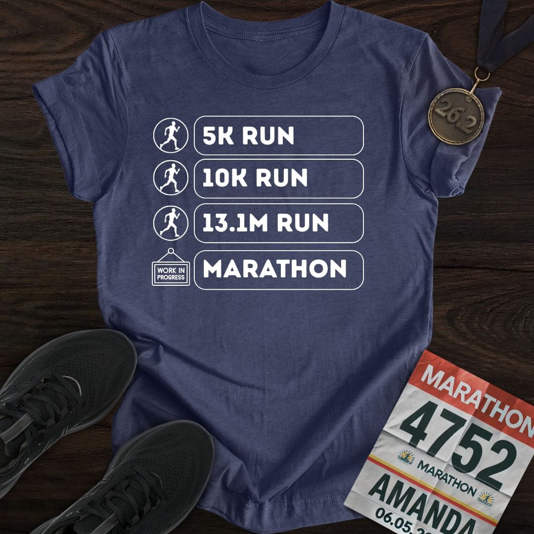 Printify T-Shirt Heather Navy / S Marathon: In Progress T-shirt