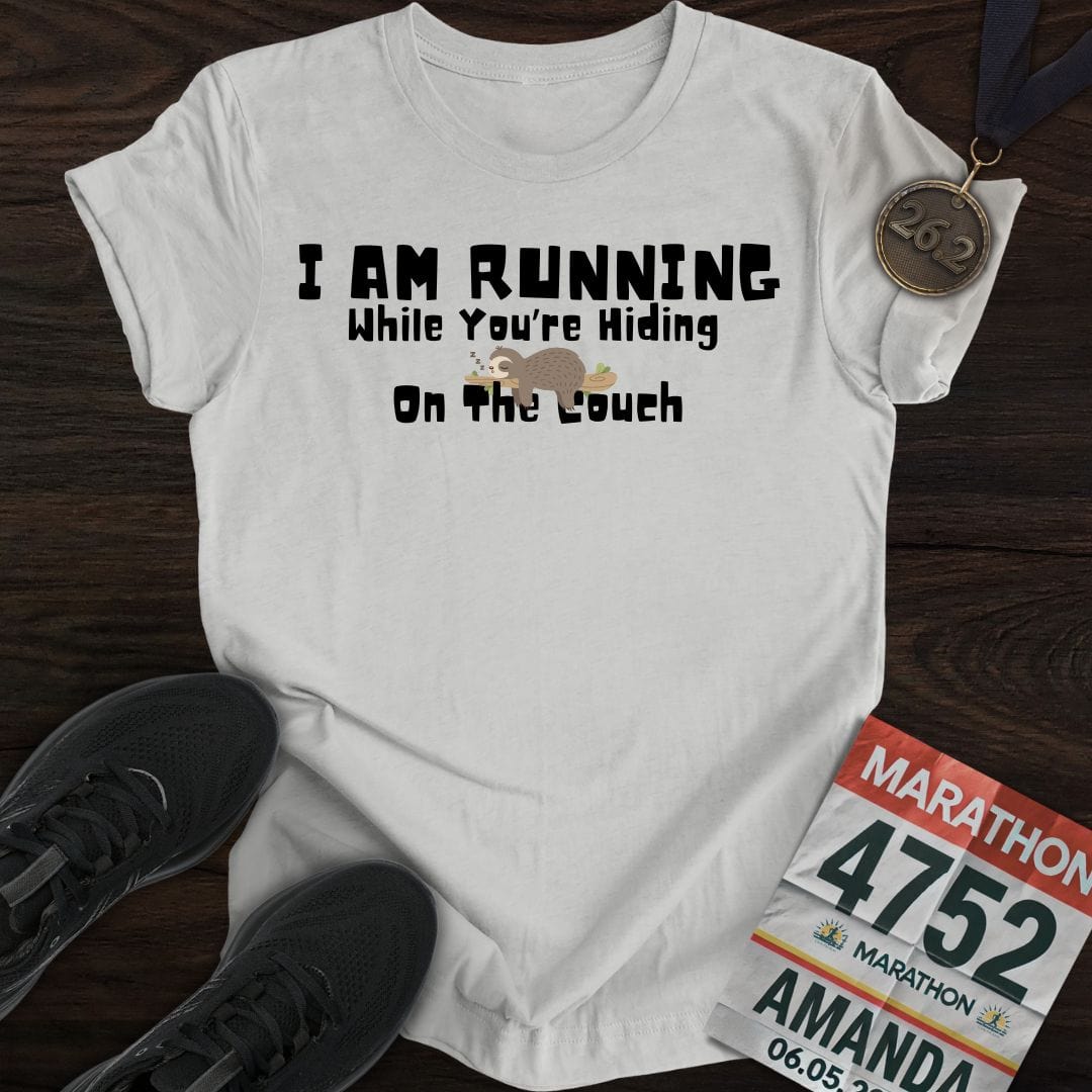 Printify T-Shirt Sport Grey / S I’m Running While You’re Hiding on the Couch T-shirt