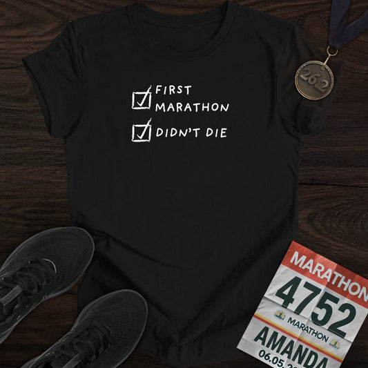 Black "First Marathon and Didn't Die" t-shirt, designed for marathon finishers and runners.