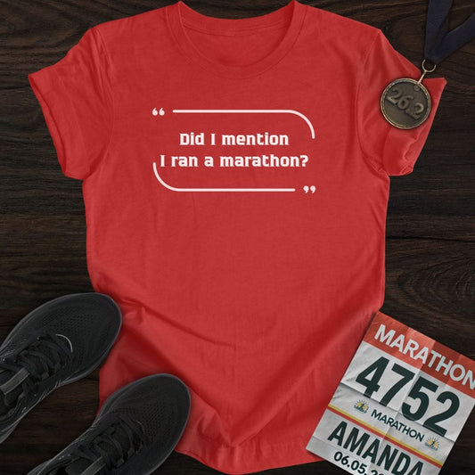 A heather red 'Did I mention I ran a marathon?' t-shirt shown from the front.