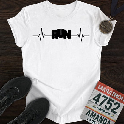 A classic white 'Run with Your Heart' t-shirt, showcasing the simple and powerful 'RUN' text with a heartbeat rhythm.